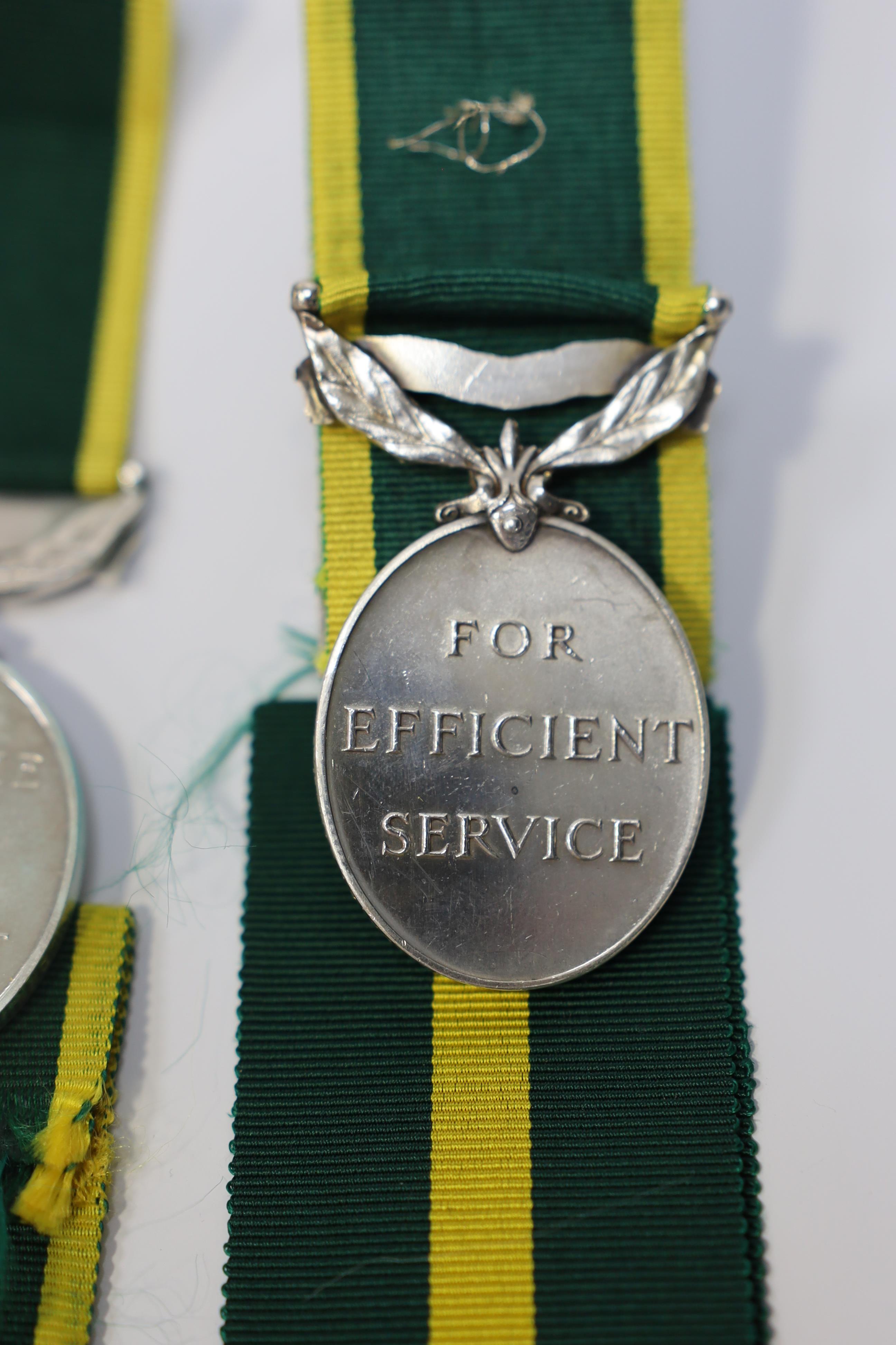 Six assorted Efficiency medals; GV (C) India to Pte.F.S.Slee,1 E.I.RY.R.,A.F.I.;GV (A) Territorial to 477046 Sjt H.W.Pawley, R.A.M.C.; GVI Militia to 2313197 Sclmn.S.H.Dummer, R.Signals.; GVI Territorial to 1434970 Gnr C